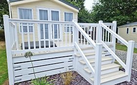 Rosefinch Sleeps 2 Persons-Private Hot Tub-Tranquil Holiday Away From It All Yet Not Far From St Austell- The Holiday Home Has One Bedroom, Living And Dining Area, Equipped Kitchen-Decking-Outdoor Furniture-Fishing Lakes-Non Pet Unit